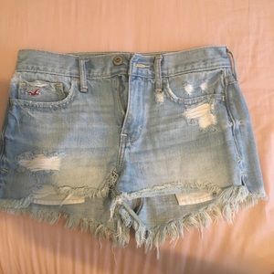 Distressed mid rise short shorts
